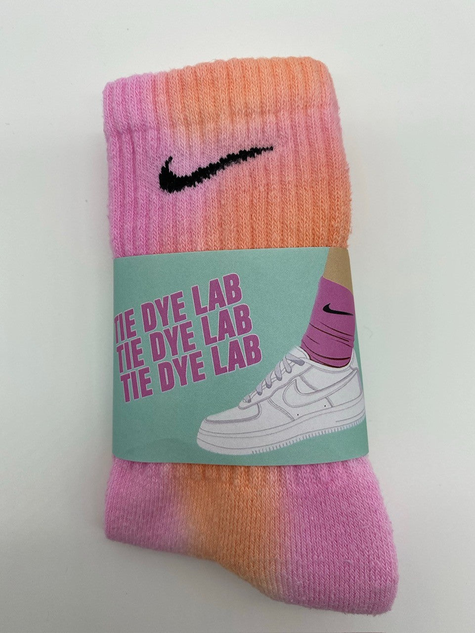 Fruit salad pink and orange Nike tie dye socks