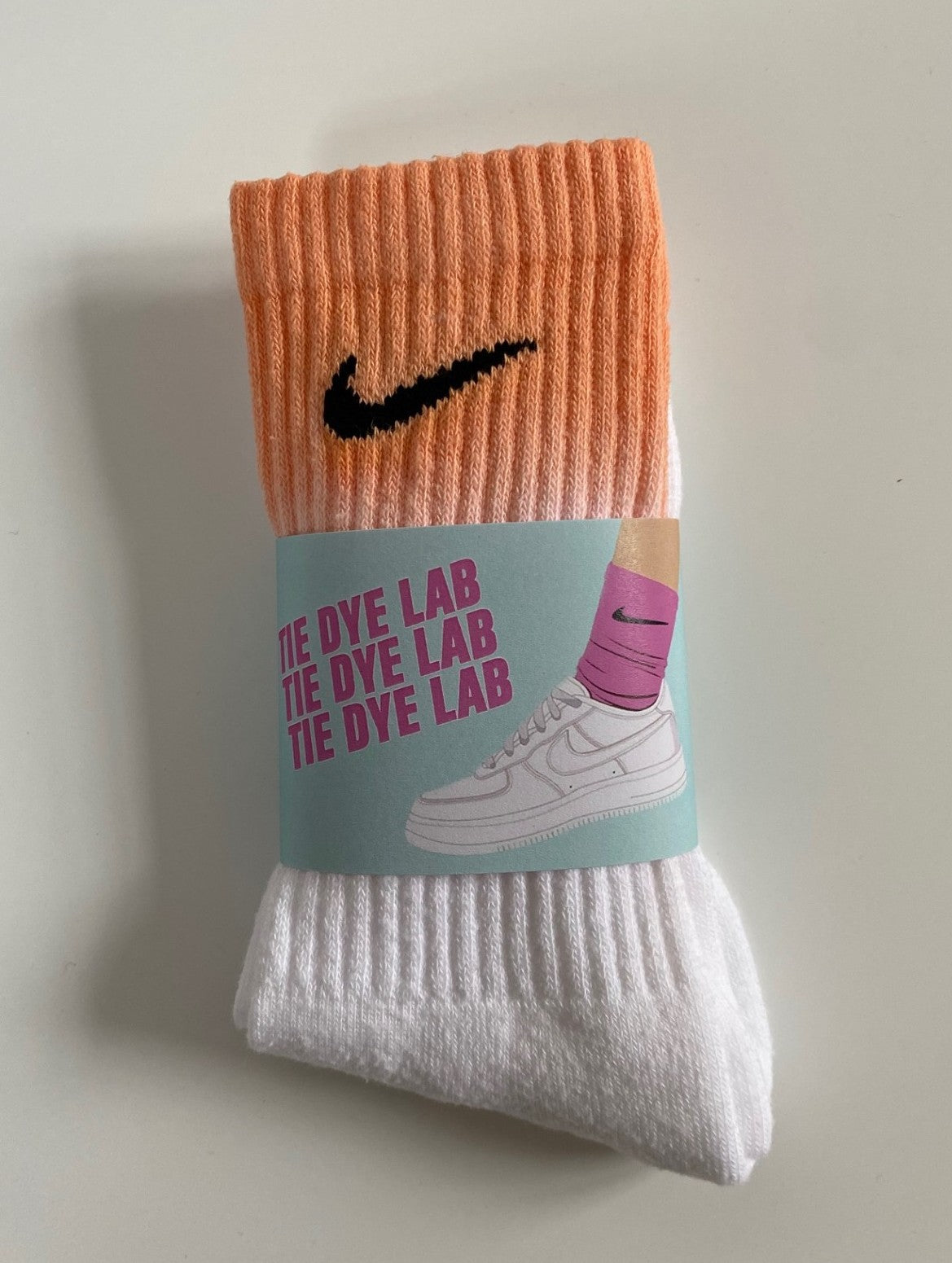 Orange dust orange and white nike tie dye socks