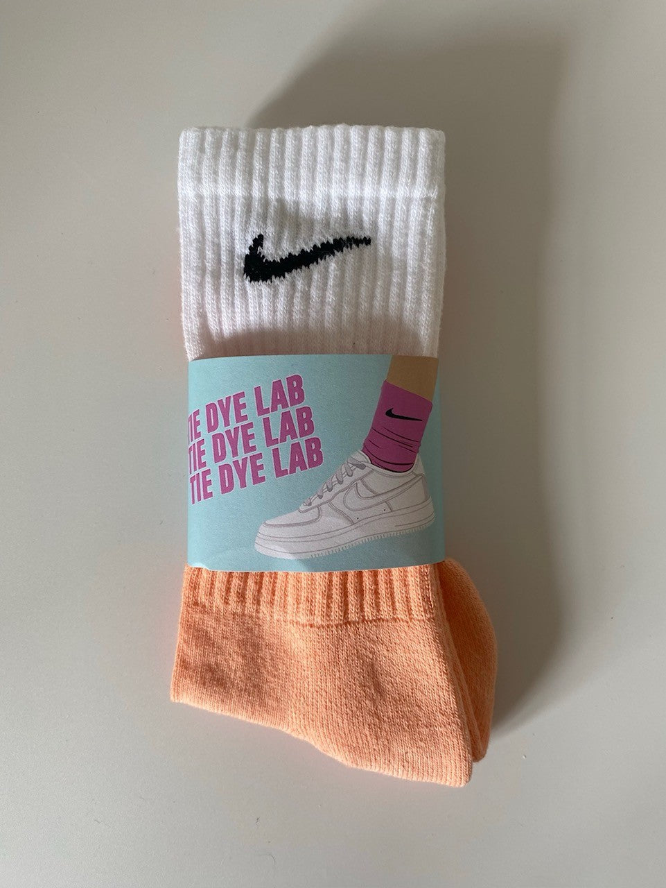 Orange dip dye orange and and white nike tie dye socks