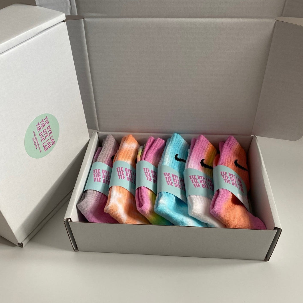 6 pairs of Nike tie dye socks in a box