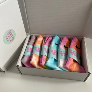 6 pairs of Nike tie dye socks in a box