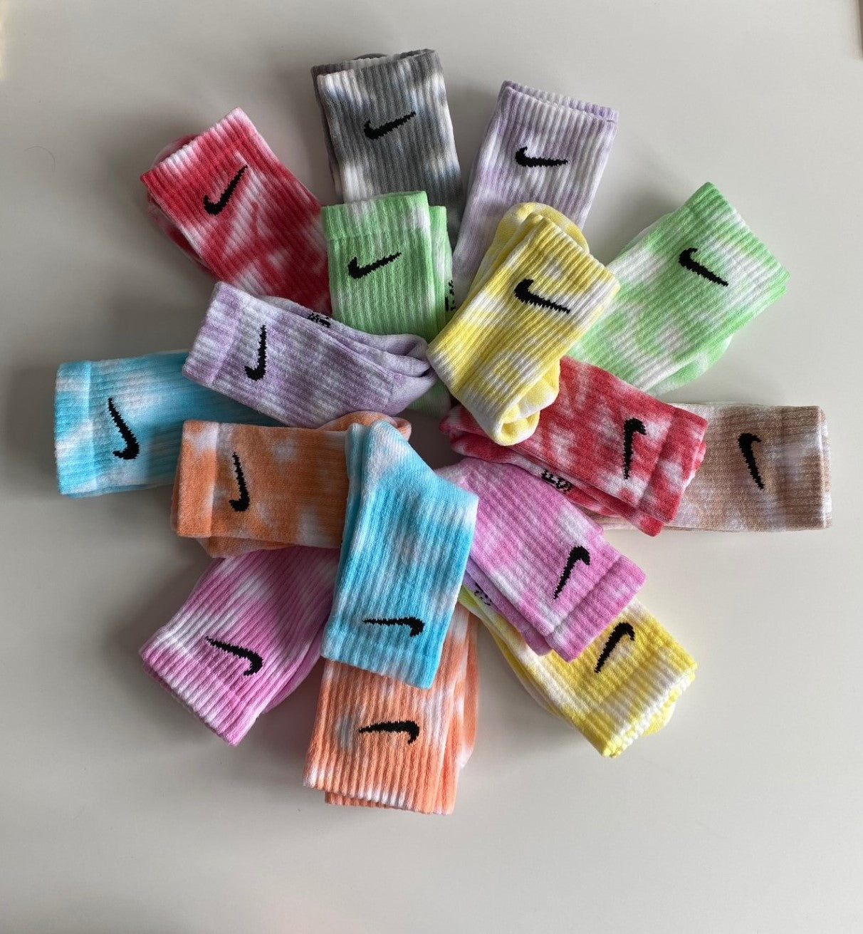 Group of Nike tie dye socks green pink blue lilac red yellow orange brown black